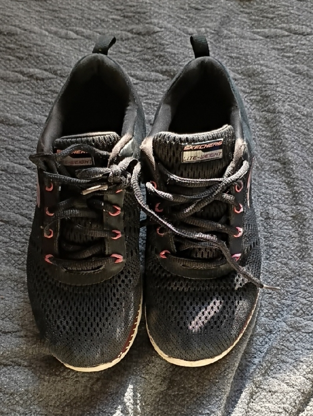 Skechers Black Womens Sneakers with Pink Eyelet Details